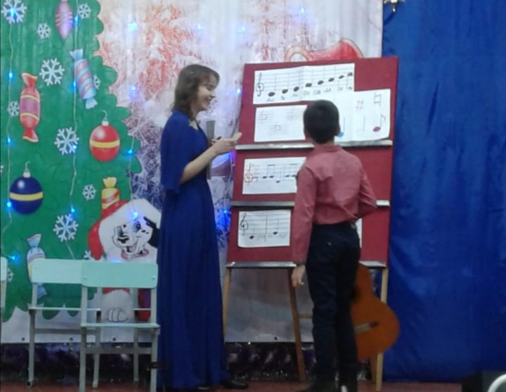 Фото Выполнение заданий по сольфеджио, как испытание для посвящения детей в музыканты.